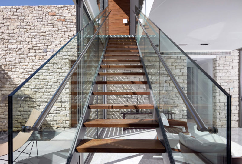 LIVING: IROKO WOOD AND GLASS STAIRCASE