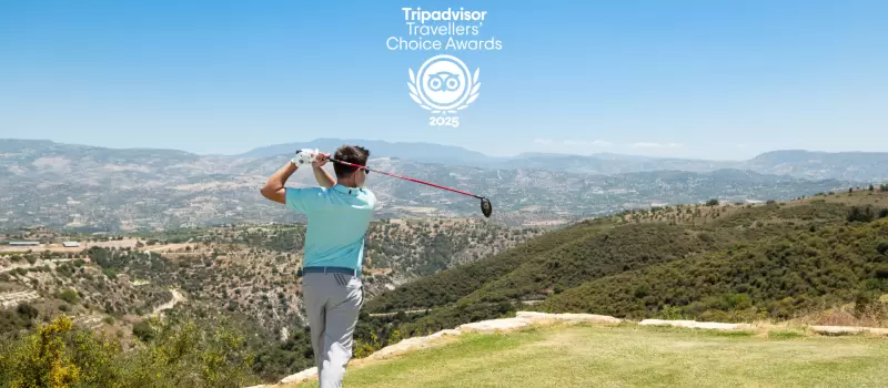 A golfer tees off at Minthis Resort, a Golf course in Cyprus that is a recent recipient of the Triadvisors' Traveler's Choice Awards 2025