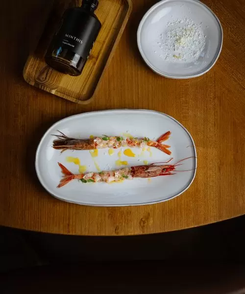 An overhead photo of a prawn dish, available for consumption at Amaracus Restaurant in Paphos, Cyprus