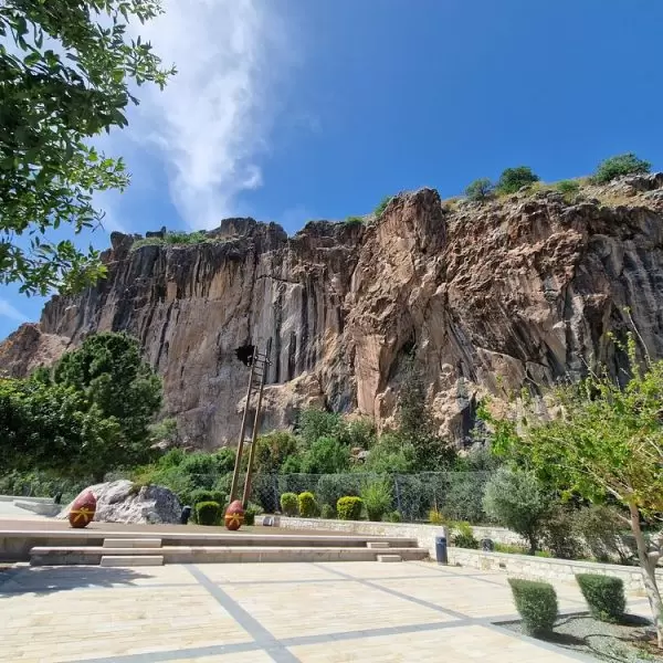Easter decorations are visible in Paphos with a cliff face present in the background