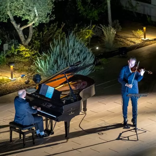 An aerial shot of two performers at the Minthis Resort in Paphos - luxury rental properties available.